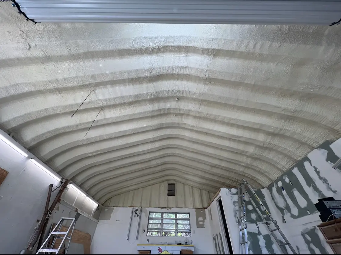 Spray polyurethane foam applied to the underside of a metal roof deck in Goleta